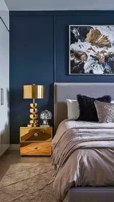 a modern bedroom with metallic accents including a WxIG3iT8TzqfWsAtSd3u3A cLwb3GMkQuCgaMZewXPI5g.jpg